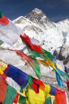 view of Mount Everest with buddhist prayer flags