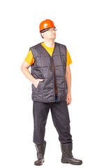 Worker in vest and glasses.