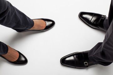 Businessman's and businesswoman's legs