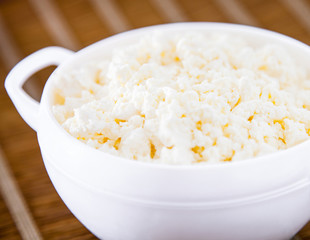 Fresh cottage cheese in a bowl