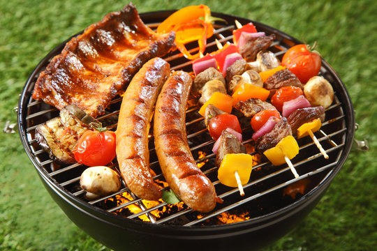 Assorted grilled meat on a summer barbecue