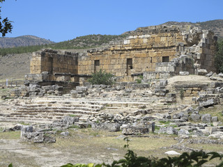 Fototapeta na wymiar Ruins of the ancient city of Hierapolis and blue sky