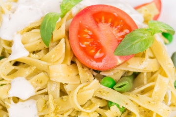 Pasta with dressing and green beans