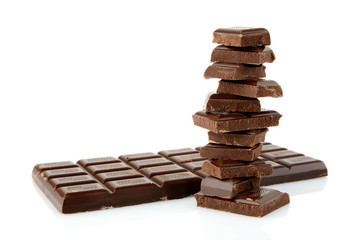 Stack of blocks of chocolates on white background
