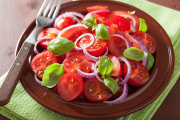healthy tomato salad with onion basil olive oil and balsamic vin