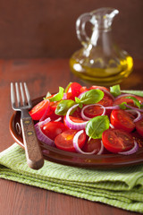 healthy tomato salad with onion basil olive oil and balsamic vin