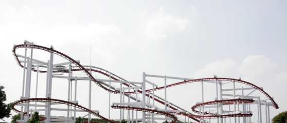 a rollercoaster in an amusement park