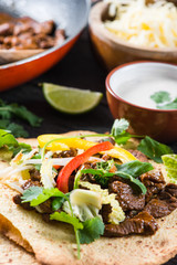 close view on mexina tacos with beef and vegetables