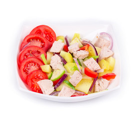 Warm meat salad with vegetables