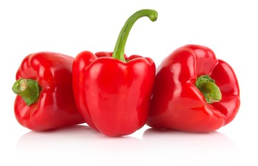 Studio shot of red bell peppers isolated on white