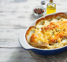 Baked meat with potatoes and cheese