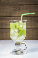 Kiwi refreshing drink on a wooden table.
