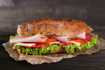 Fresh and tasty sandwich with ham and vegetables