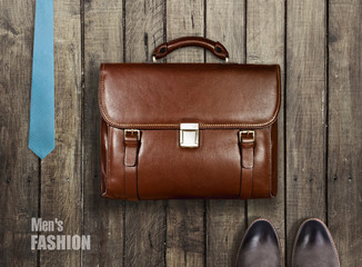 men's clothing and accessories on a wooden  background