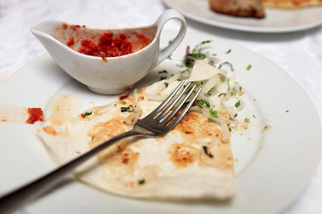 Leftovers of sauce and kebab