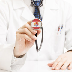 Doctor holding stethoscope with flag series - French Polynesia