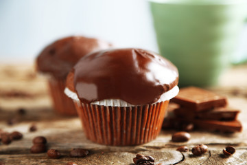 Tasty homemade chocolate muffins and cup of coffee