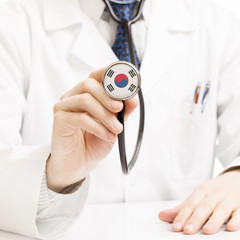 Doctor holding stethoscope with flag series - South Korea