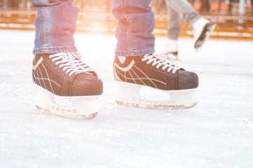 Man feet on skating rink