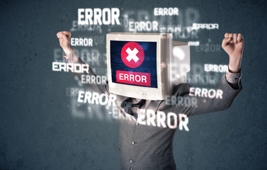 Business man with pc monitor on his head and error messages on t