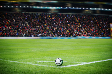 On the stadium. Soccer field with soccer ball and line