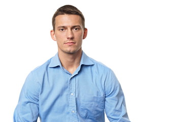 Fototapeta premium Portrait of young businessman in blue shirt