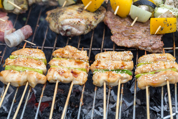 barbecue with delicious grilled meat and vegetables on grill