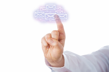 Fototapeta premium Touching A Swarm Of Email Icons Forming A Cloud