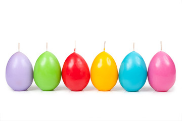 Candles in the form of Easter eggs