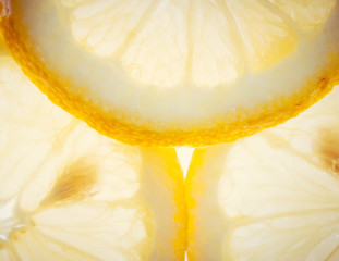 Slices of fresh lemon isolated on white background