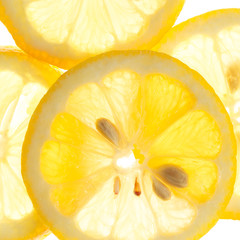 Slices of fresh lemon isolated on white background