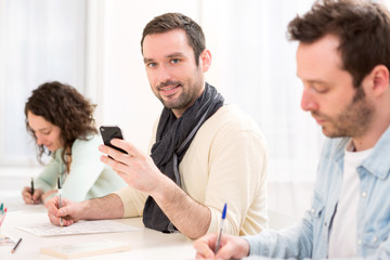 Obraz premium Young attractive student during classes