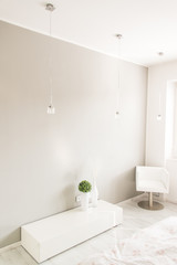 white luxury room with chair