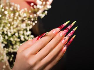 Beauty pink floral design nails.
