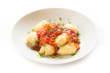 Fototapeta na wymiar Gnocchi di patate con salsa di pomodoro