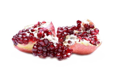 Ripe pomegranate fruit isolated on white background