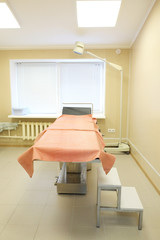 Patient examination table in a doctors office