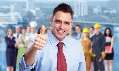 Happy businessman and group of people.