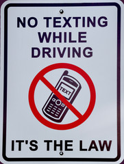 No texting while driving, its the law sign