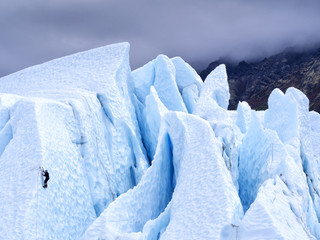 Fototapeta na wymiar Ice Climber on a Glacier in Alaska