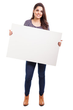 Cute girl with a white sign