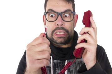 Surprised guy with telephone