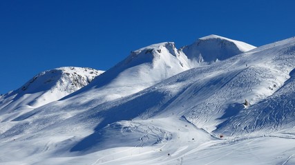 Fototapeta na wymiar Ski slope and mountain, ski area Stoos