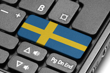 Go to Sweden! Computer keyboard with flag key.