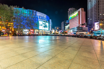 empty square and commercial buildings in modern city