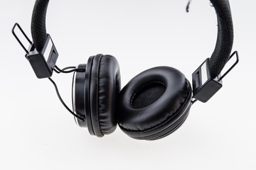 Black Pair of Headphones Isolated on a White Background