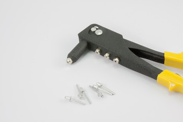 black rivet pliers and rivet