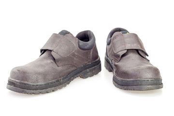 Old black safety shoe for worker
