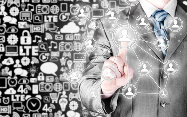 man hand pressing social media icon