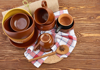 plates and cups on wooden table
